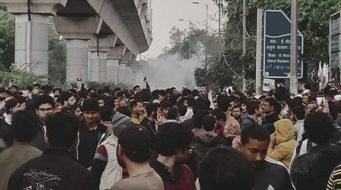 Tear gas shell shot into a crowd of protesting students at Jamia   (Source: Ajaz, JMI)