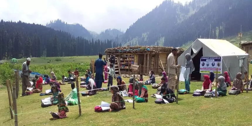 Students studying in an open air community schooling system in Kashmir. (Photo credit: Ishfaq Bashir)
