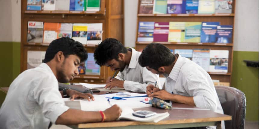 How do IITs set question papers for open-book exams?