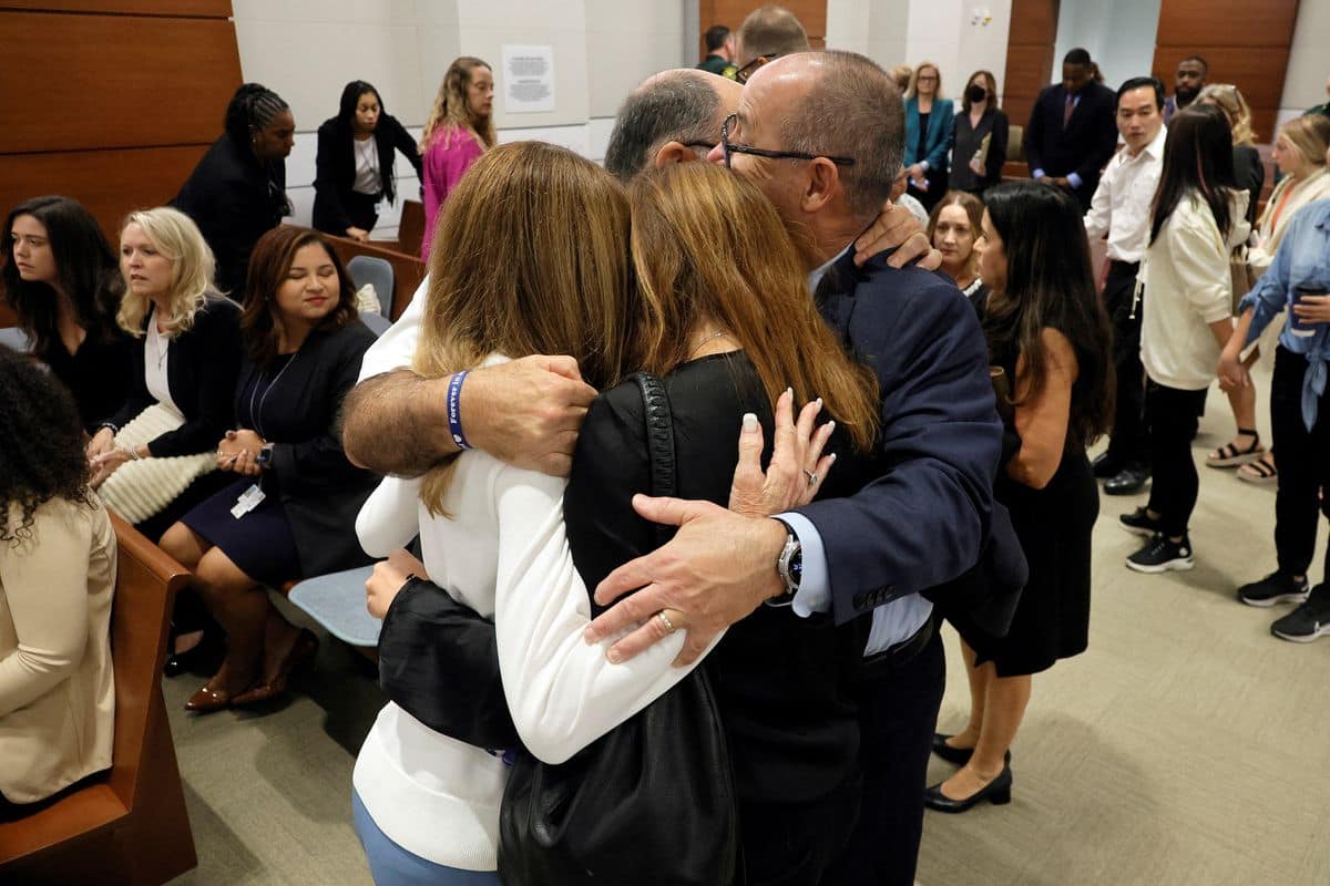 Families devasted after the news. (Picture: Reuters)