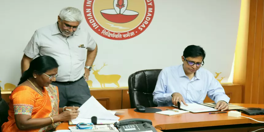 V Kamakoti director of IIT Madras and R Meenakumari director of NIS signing an agreement in the presence of Ravindra Gettu, IITM.