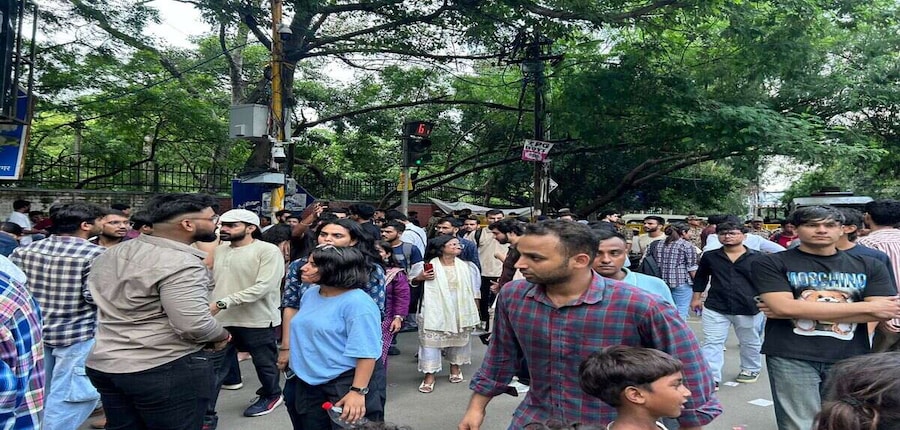 Students cast their votes at Delhi University during the DUSU 2025 elections under heightened security and judicial oversight. (Image: Careers360)