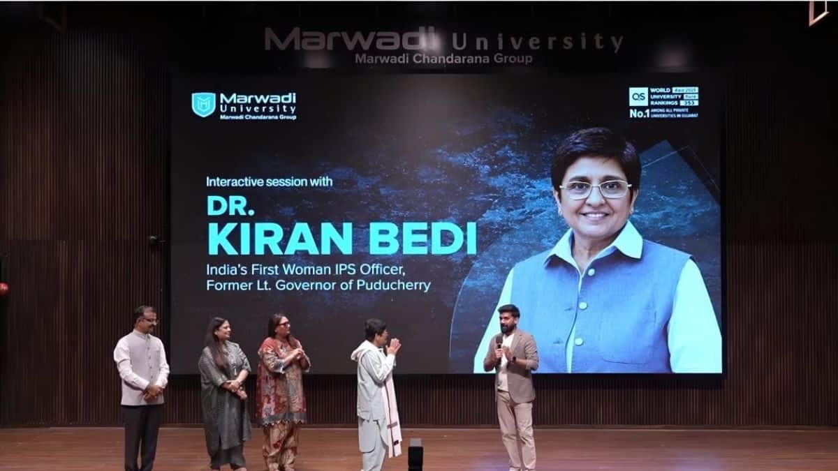 Kiran Bedi addresses students, parents and faculty members at Marwadi University. (Image: Press Release)