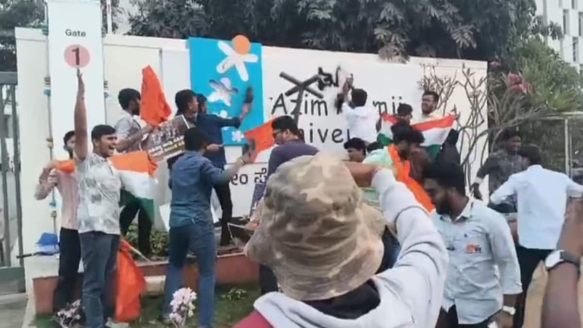 Individuals alleged to be members of Akhil Bharatiya Vidyarthi Parishad (ABVP) vandalise gate 1 of Azim Premji University in Bengaluru during a dispute over a campus event. (Image: AISA)