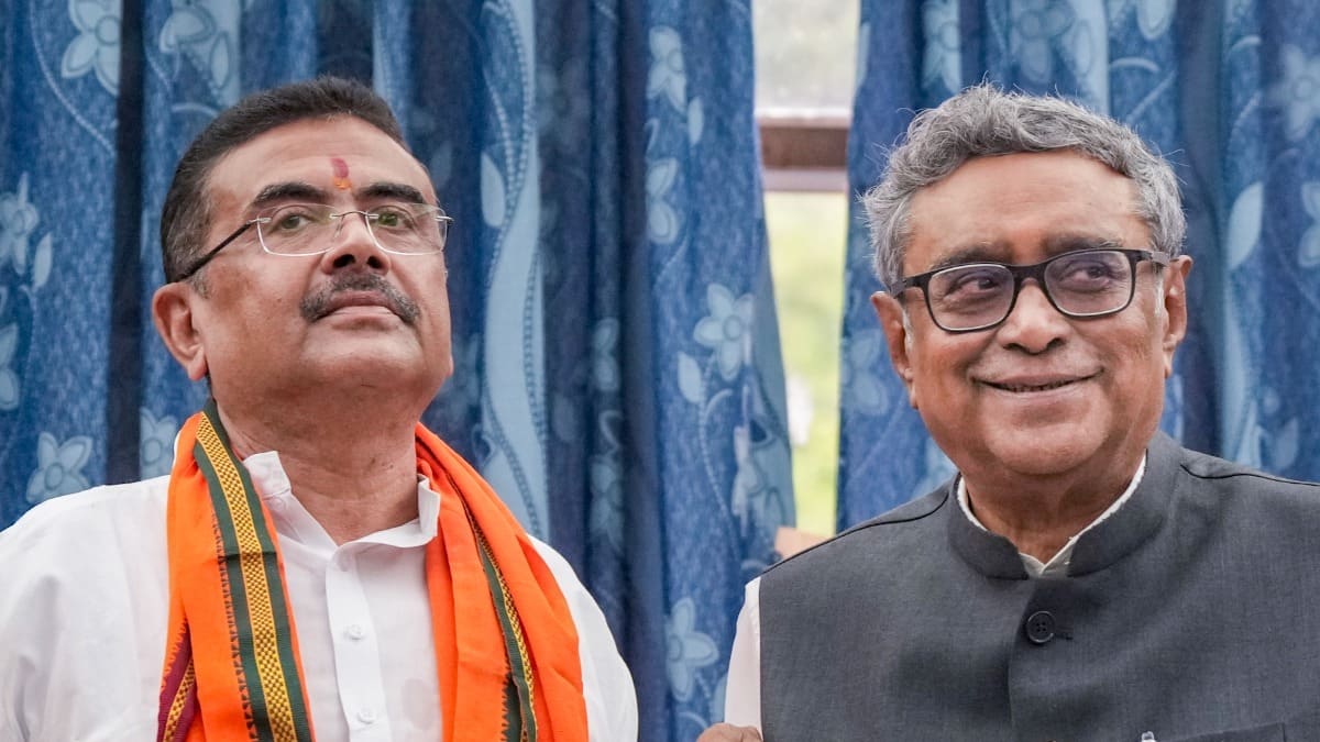 Swapan Das Gupta, minister in charge, Finance Department with Suvendu Adhikari, Chief Minister during budget presentation (Image : PTI)