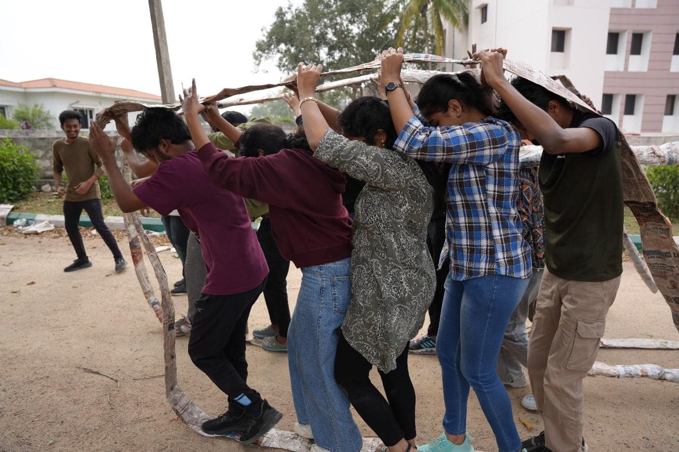 A group of people holding a stick

AI-generated content may be incorrect.