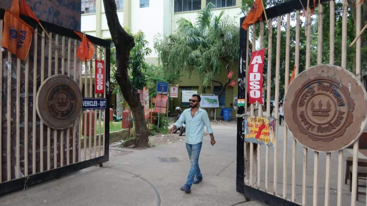 Jadavpur University gate with restored emblem