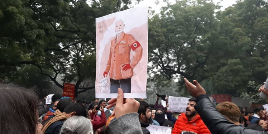 Painting of PM Narendra Modi wearing a red arm-band associated with the Nazis. BJP's lotus has replaced the Swastika  (Photo: Radhika)