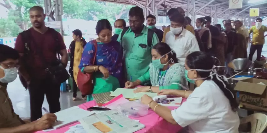 Health workers in Kerala collecting passenger details