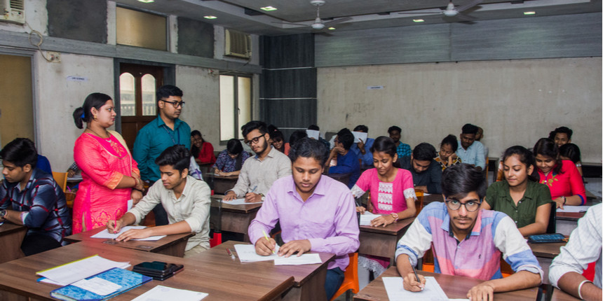 Students writing university exams. (Source: Shutterstock)
