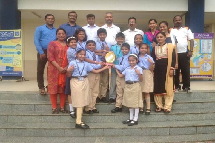 Podar International School-Trophie to the School