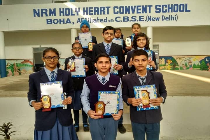 NRM Holy Heart Convent School-Students with Trophies