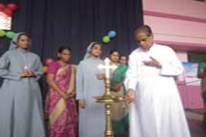 Mariam Thresia Public School-Lighting the lamp