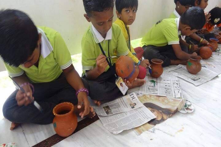 Wisdom Wealth International School-Pot Painting