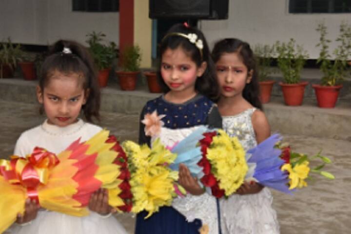 St Pushpa Senior Secondary School-Children with Flower Bokeh