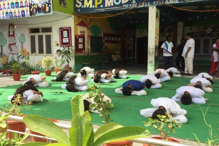 S M P Model High School-Yoga Day