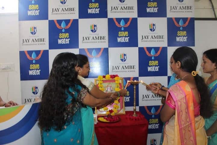 Jay Ambe International School-Lighting The Lamp